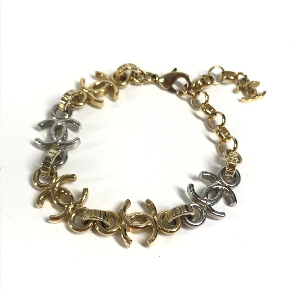 CHANEL Silver Logo Charm Bracelet